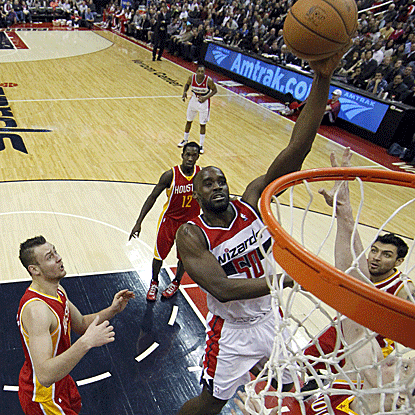 Emeka Okafor scores 17 points and hits the go-ahead free throw with 5.2 seconds remaining in the Wizards' win. (AP)