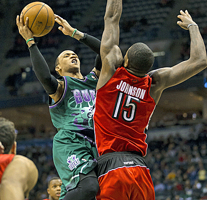 Monta Ellis scores six of his 23 points in overtime as the Bucks get a big win in their playoff push. (USATSI) 