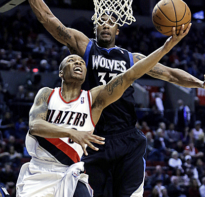 Damian Lillard puts together a strong all-around game with 24 points, six rebounds and four assists.  (AP)