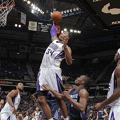 Jason Thompson scores 18 points and grabs a game-high 14 rebounds in the Kings' victory against the Bobcats. (Getty Images)