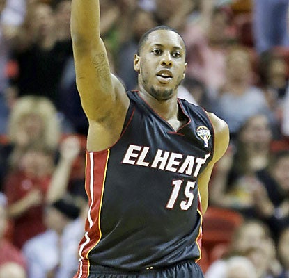 The Heat ride the hot hand of Mario Chalmers, who finishes with 26 points on 7-of-9 shooting, including five 3s. (AP)