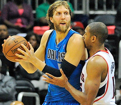 Dirk Nowitzki, who scores 22 points, is one of six Mavericks to score in double figures against the Hawks. (USATSI)