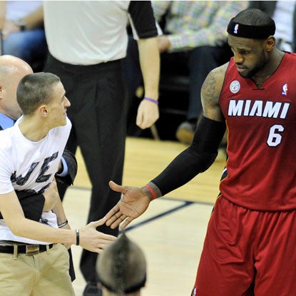 This fan wants LeBron back in Cleveland and it's easy to see why as James puts up a triple-double.  (USATSI)