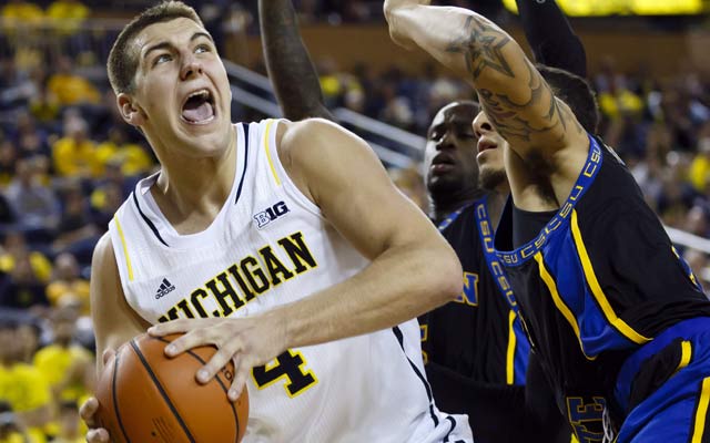 Michigan's Mitch McGary is going to the NBA rather than serve his suspension. (USATSI)