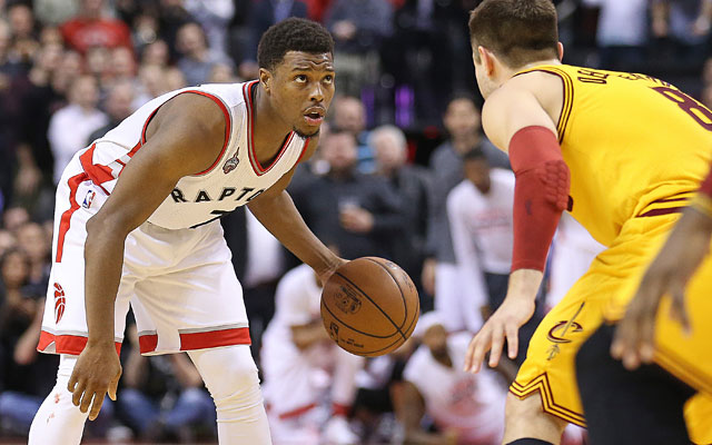 Kyle Lowry breaks down Cleveland's Matthew Dellavedova before hitting the winner. (Getty Images)