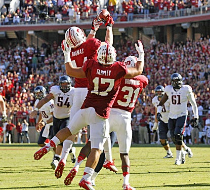 Stanford outside linebacker Chase Thomas (44) intercepts a tipped pass by Matt Scott in overtime. (US Presswire)