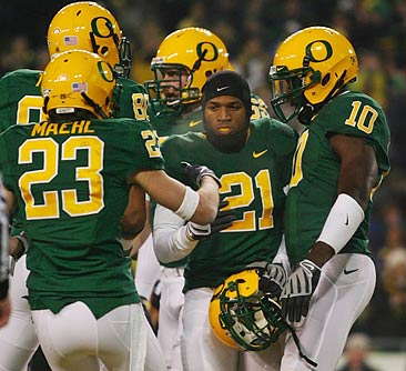 LaMichael James (21) celebrates one of his three TDs. 