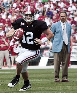 Nick Saban keeps a watchful eye on his quarterback during Alabama's spring game. (Getty Images)