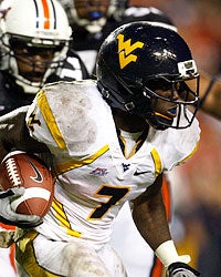 Noel Devine needs 1,784 yards as a senior to surpass Avon Cobourne on West Virginia's career list. (Getty Images)