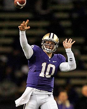 Jake Locker is working on hitting receivers in places where they can make yards after the catch. (US Presswire)