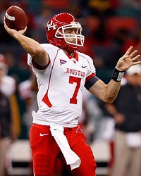 Case Keenum needs 4,123 yards to break Timmy Chang's I-A record of 17,072 career passing yards. (Getty Images)