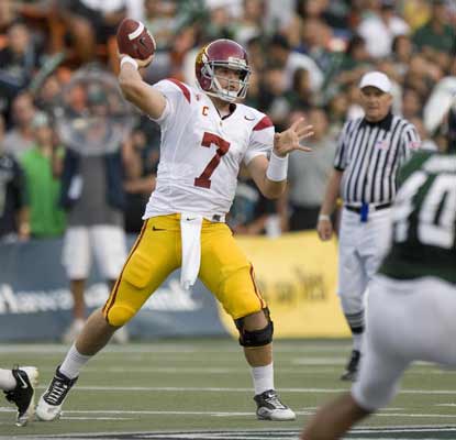 Matt Barkley ties a school record by throwing five TD passes during USC's hard-fought victory over Hawaii.  (AP)