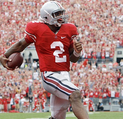 Terrelle Pryor, who runs for a game-high 113 yards, high-steps into the end zone for his lone rushing touchdown.