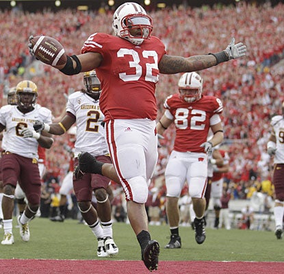 John Clay runs for 123 yards and the go-ahead touchdown as Wisconsin survives a scare. (AP)
