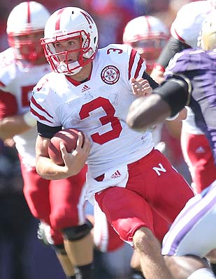 QB Taylor Martinez gets out in front of Nebraska's running attack. (Getty Images)