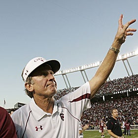 Steve Spurrier waves to the crowd after beating 'Bama. But will beating No. 1 breed success? (AP)