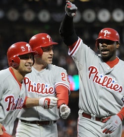 Shane Victorino, Chase Utley and Ryan Howard refuse to be phased by the Giants. (Getty Images)