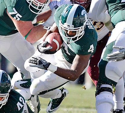 Edwin Baker helps Michigan State shake off its first loss with 179 yards and four touchdowns vs. Minnesota.  (AP)