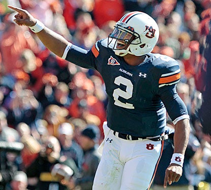 Cam Newton throws for a career-high 317 yards and four TDs as Auburn gets a one-week break from the SEC slog.  (AP)
