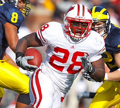 Montee Ball rushes for 173 yards and four TDs to keep Wisconsin in line for its first Big Ten title since 1999.  (US Presswire)