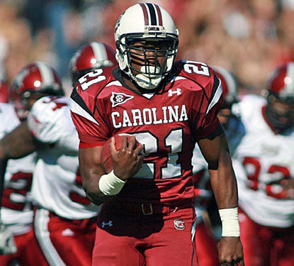 Marcus Lattimore scores three touchdowns, moving within one of Reggie Cobb's 1987 SEC record for freshmen.  (US Presswire)