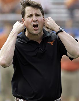 Before taking the head job at Florida, Will Muschamp made over $900,000 as an assistant at Texas. (AP)