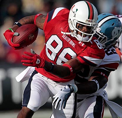 South squad (and 'Canes) WR Leonard Hankerson evades North-team defenders in Mobile on Saturday. (AP)