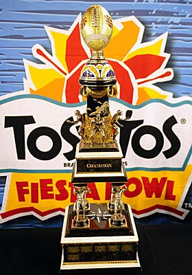 Fiesta Bowl CEO John Junker is on paid administrative leave amid a probe into alleged improper campaign contributions. (US Presswire)