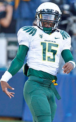 Less than a month after RB Lache Seastrunk signed with the Ducks, his mentor received $25,000 from Oregon. (US Presswire)
