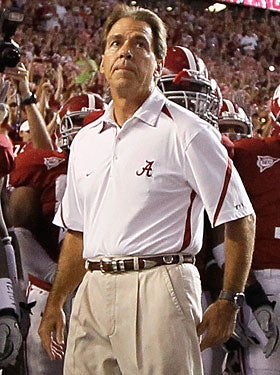 The SEC policy of informing the league about potential violations at other schools is OK with Nick Saban. (Getty Images)
