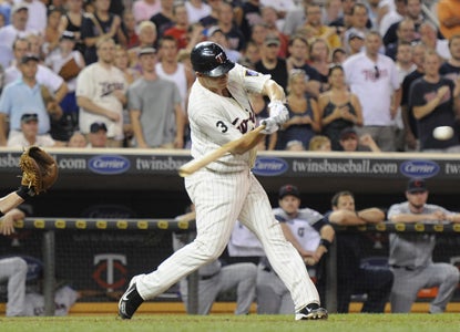     Danny Valencia rocks a two-run, walk-off single in the ninth against Indians closer, and former roommate, Chris Perez. (Getty Images)