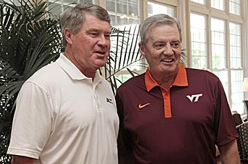 ACC boss John Swofford (left) is counting on Virginia Tech's Frank Beamer, among others, to help elevate ACC football Sept. 17. (AP)