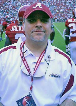 Alabama says no rules were broken in Tom Albetar's clothing store but will keep its distance anyway. 