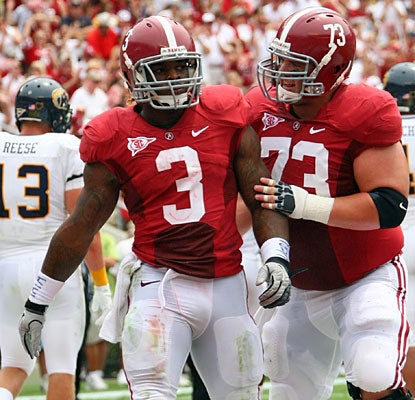 In his first game as Alabama's No. 1 back, Trent Richardson is held to 37 yards but scores three touchdowns.  (US Presswire)
