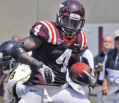 David Wilson scores the last of his three touchdowns, as the Hokies rout Appalachian State. (AP)