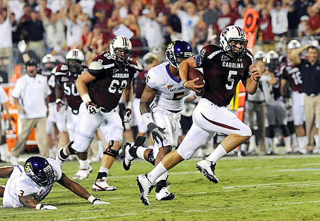 South Carolina's Stephen Garcia runs for a touchdown against East Carolina on Saturday. (US Presswire)