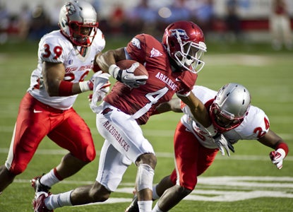 Arkansas WR Jarius Wright finishes the game with five receptions for 63 yards and a touchdown.  (Getty Images)