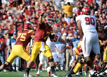 USC QB Matt Barkley passes for 263 yards and a TD while helping USC win the Pac-12 opener.  (Getty Images)