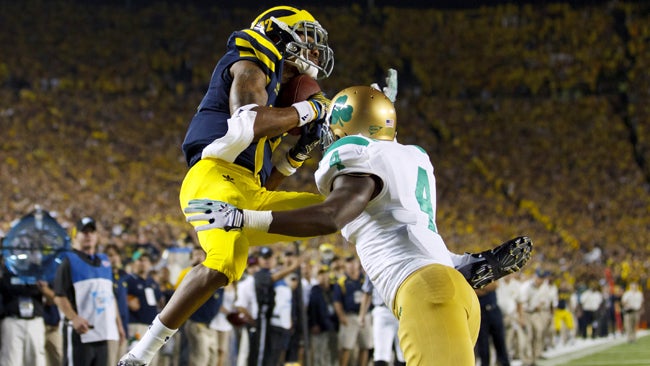 Wolverines wide receiver Roy Roundtree catches the game-winning TD late in the fourth quarter. (US Presswire)