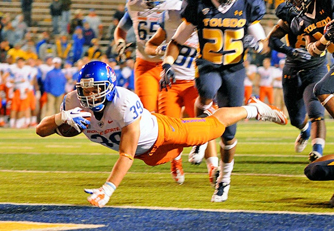 Boise State running back Drew Wright scores a touchdown against Toledo in the second half. (US Presswire)