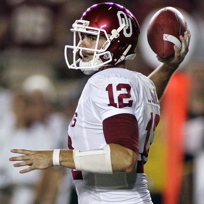 Landry Jones' 199 yards makes him Oklahoma's career passing leader, moving past Heisman Trophy winner Sam Bradford. (Getty Images)