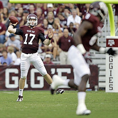 Texas A&M quarterback Ryan Tannehill throws for 337 yards and two scores in less than three quarters against Idaho. (AP)