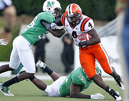 Virginia Tech's David Wilson breaks free for some of his 132 rushing yards against Marshall. (US Presswire)