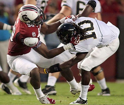 DE Devin Taylor and the Gamecocks' defense hold the Commodores to just 77 yards on offense.  (US Presswire)