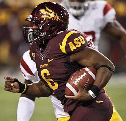 Cameron Marshall rumbles for 141 yards and scores three times as the Sun Devils smack down the No. 23 Trojans.  (AP)