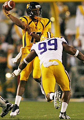 The aggressive Tigers defense forces Geno Smith into making throws too quickly. (US Presswire)