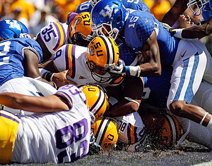 LSU quarterback Jordan Jefferson scores on his first play back from suspension in a 35-7 win over Kentucky. (US Presswire)
