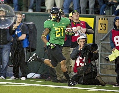 Oregon's LaMichael James scores on a 53-yard run against California. He later hurts his arm and leaves the game. (US Presswire)