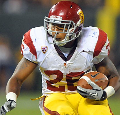 Southern Cal's Marc Tyler carries the ball during the second quarter against California. (US Presswire)