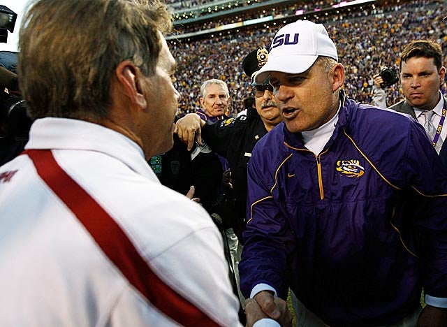 Les Miles will greet Nick Saban on less friendly turf on Nov. 5, when LSU visits 'Bama. (Getty Images)